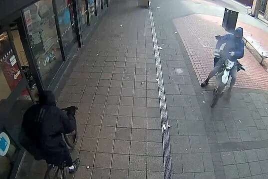 Shock moment teen gunman shoots cyclist outside Co-op in broad daylight