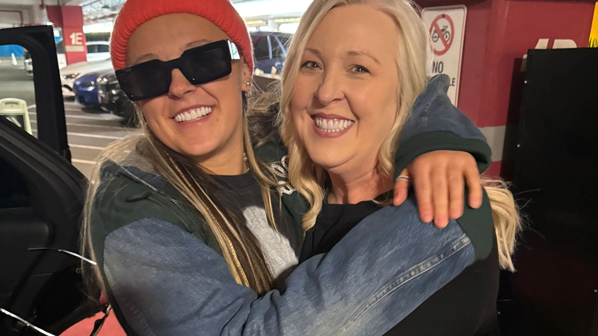 JoJo Siwa arrives back in the US and is greeted by Dance Moms star mum