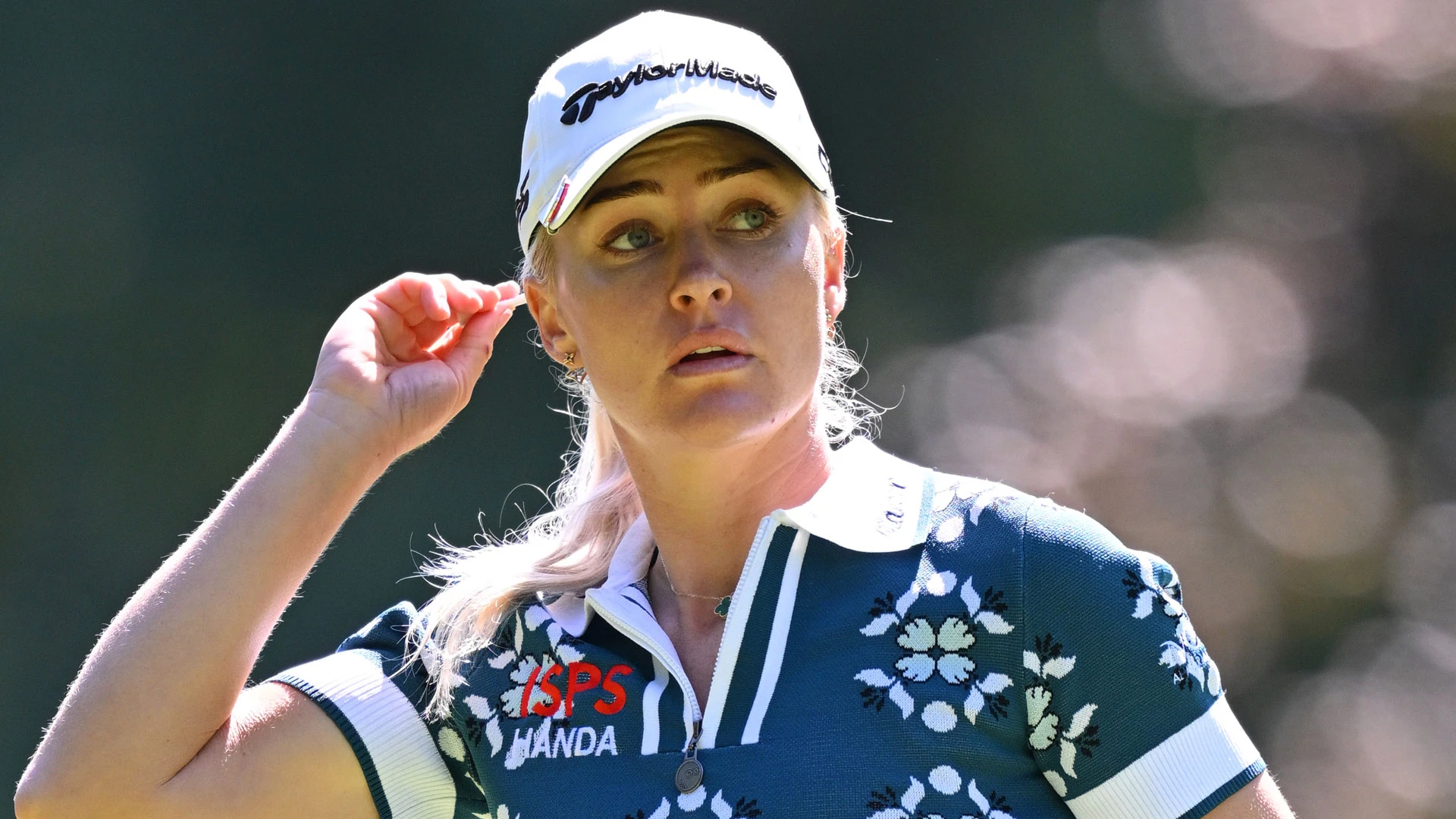 Hull issues health update after golfer carried off following collapse