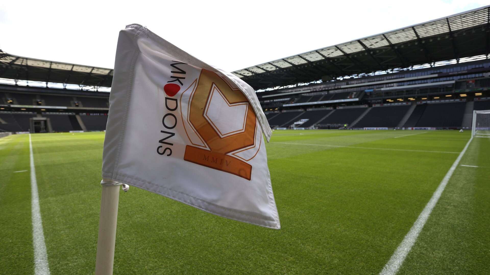 MK Dons to change badge after two-decade backlash to move from Wimbledon