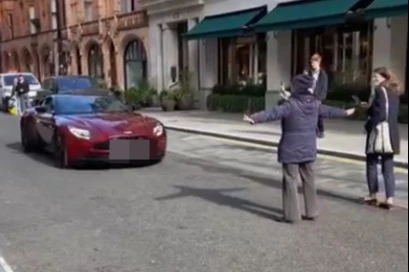 Moment angry OAP stops 'noisy' Aston Martin in street - but who's in the wrong?