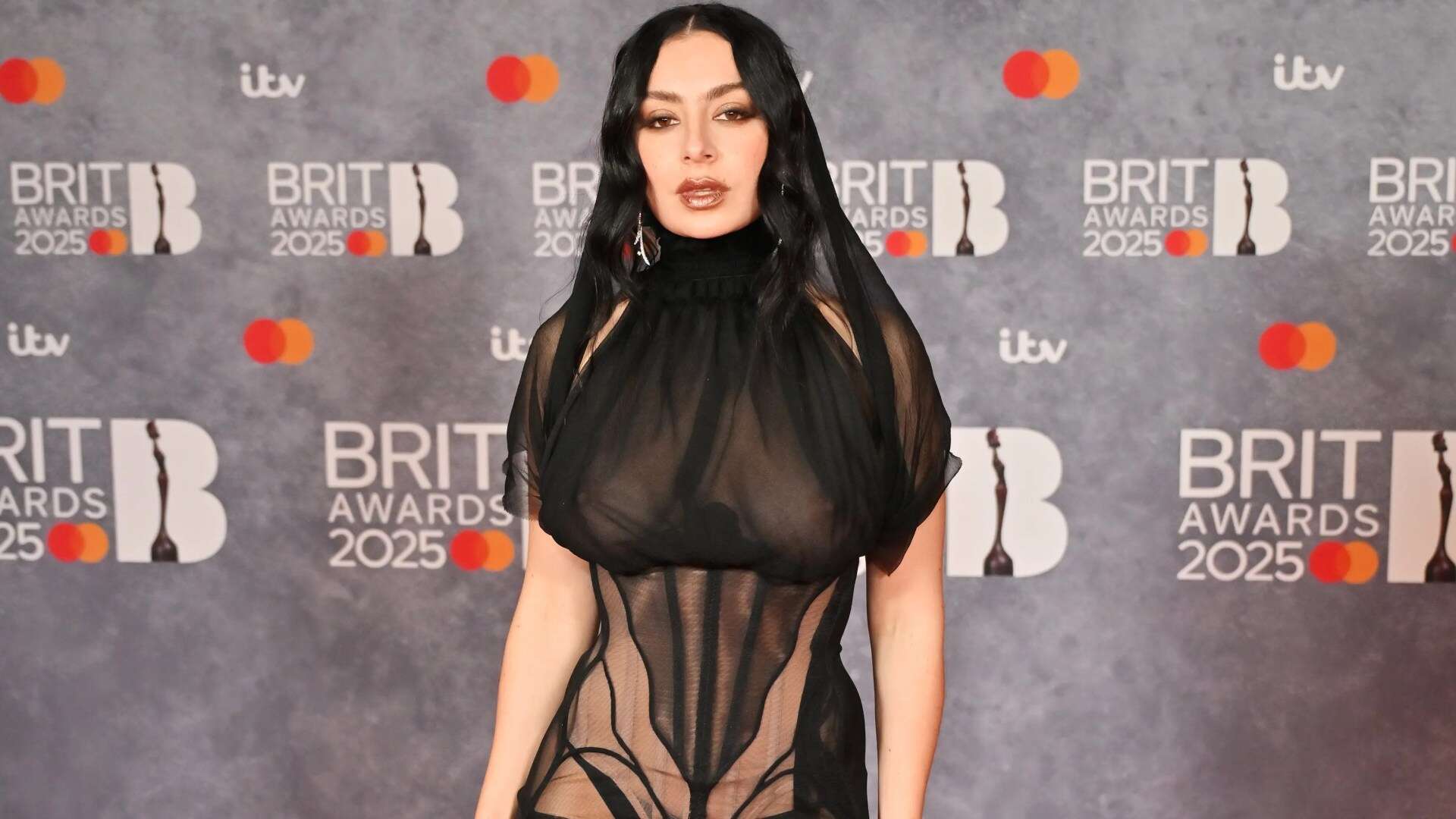 Charli XCX sweeps Brits with 5 gongs after going braless in sheer dress