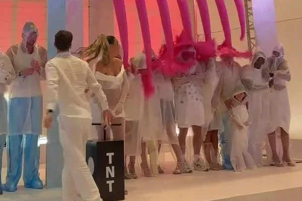 Watch couple's 'mad' & messy OTT gender reveal that sends mum flying