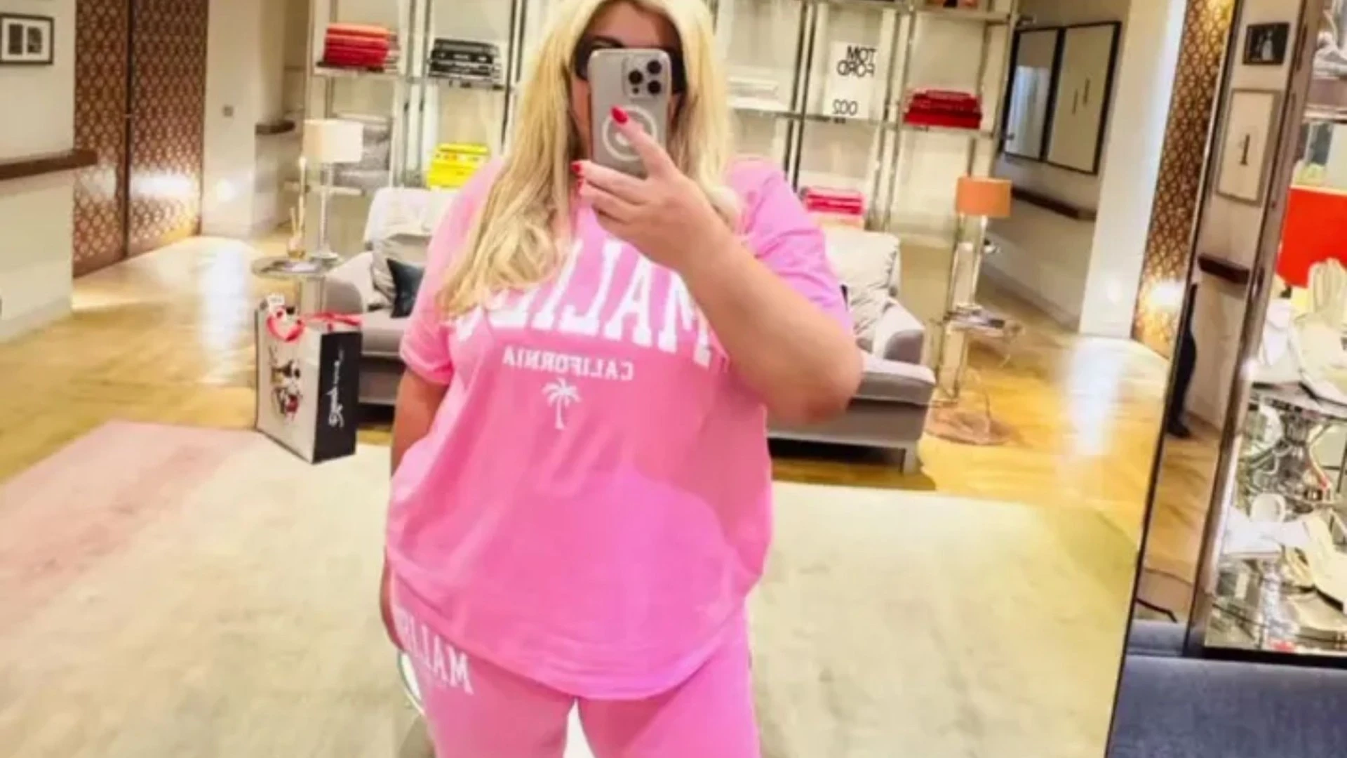Gemma Collins shows off her two stone weight loss in pink cycling shorts