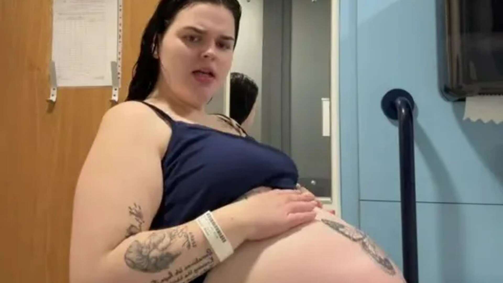 Woman shows off huge baby bump & folk say a full grown man is living inside