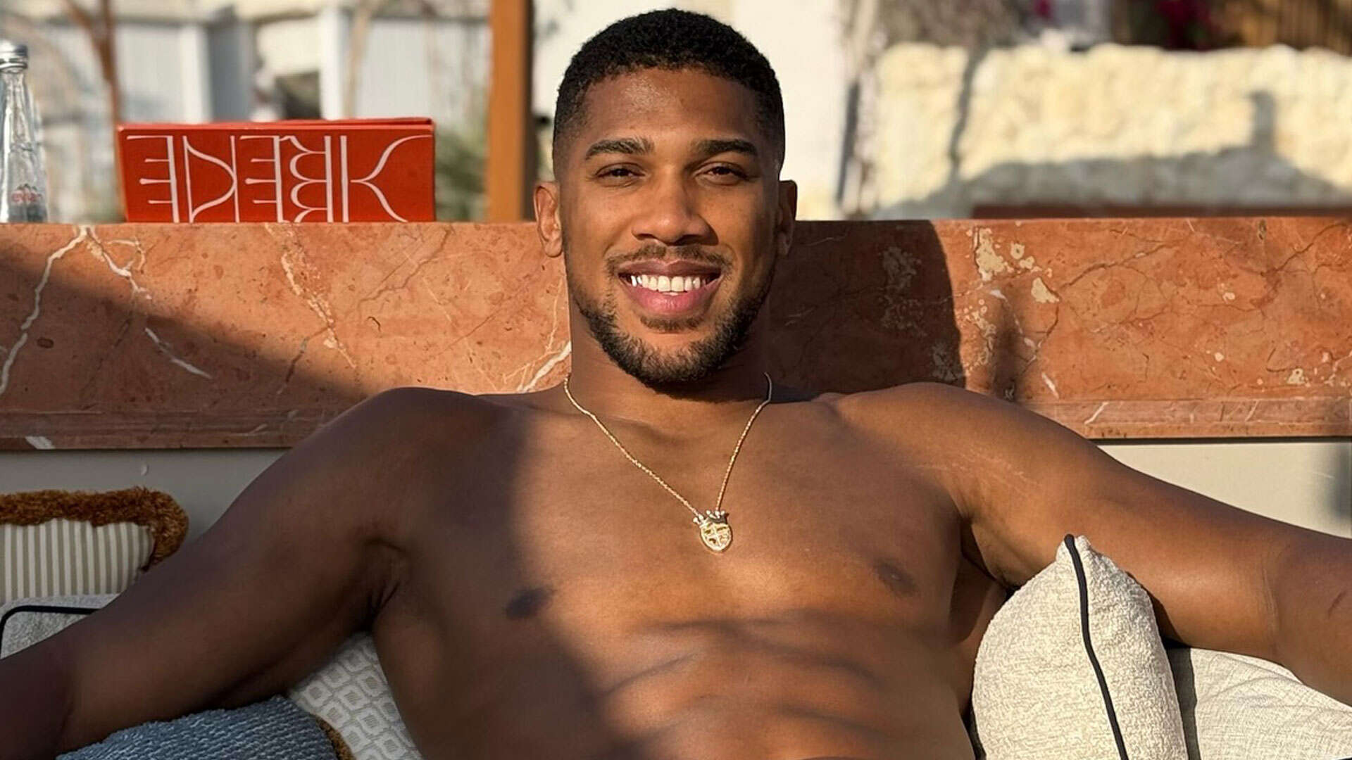 Anthony Joshua looks jacked as boxer plays chess amid Tyson Fury fight talks