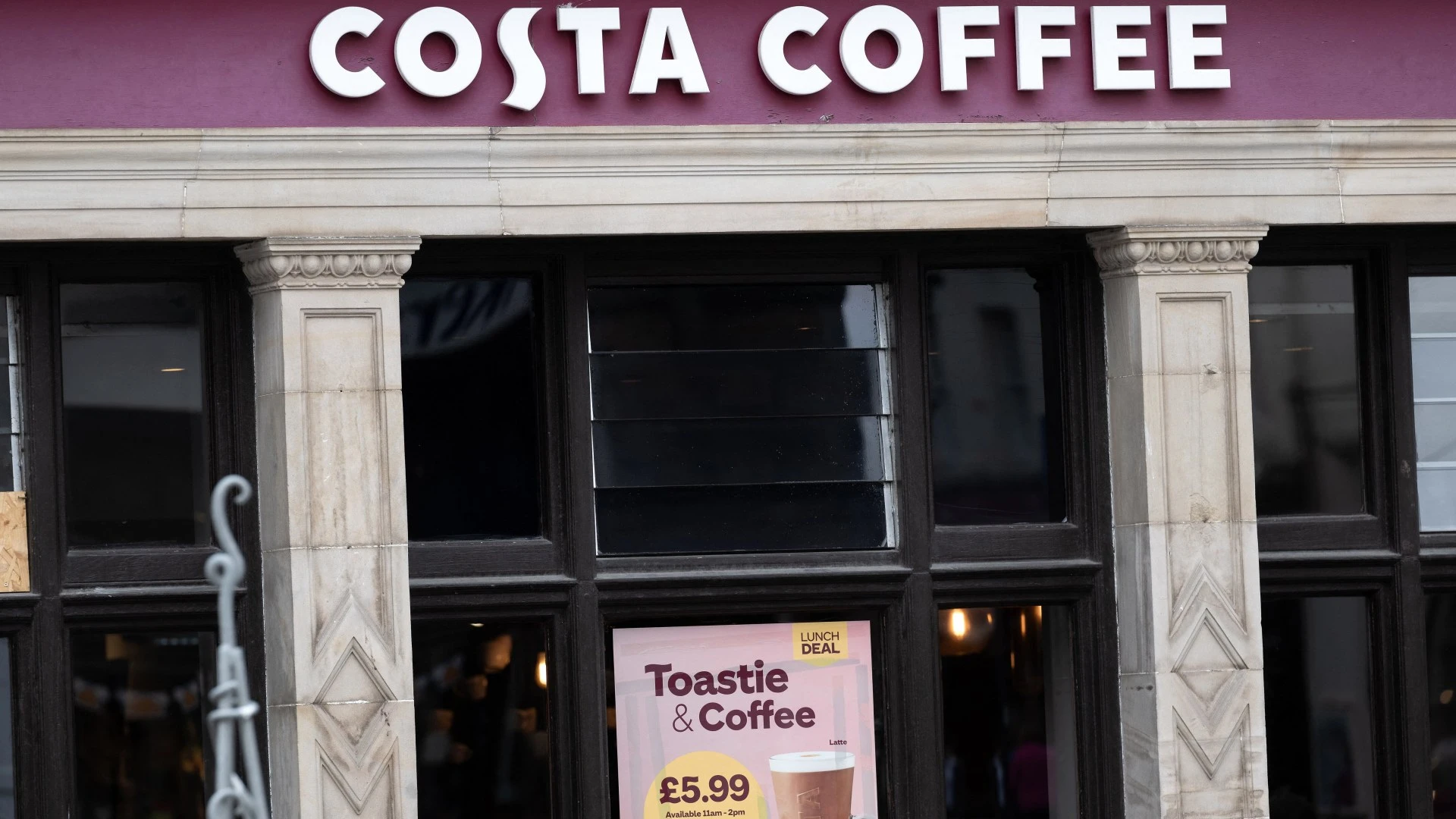 Three injured as car smashes into Costa Coffee with air ambulance deployed