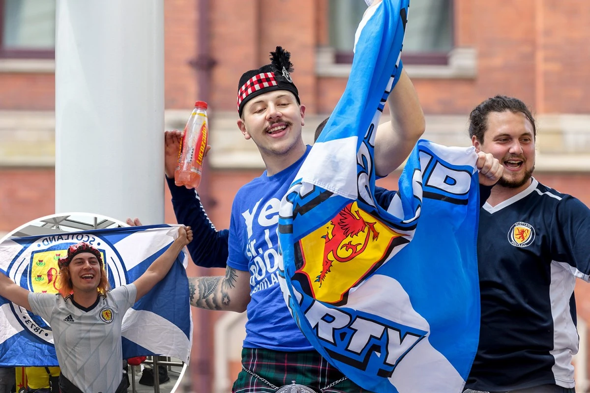 Grinning Scot fans invade Kings Cross for England V Scotland Euro 2020
