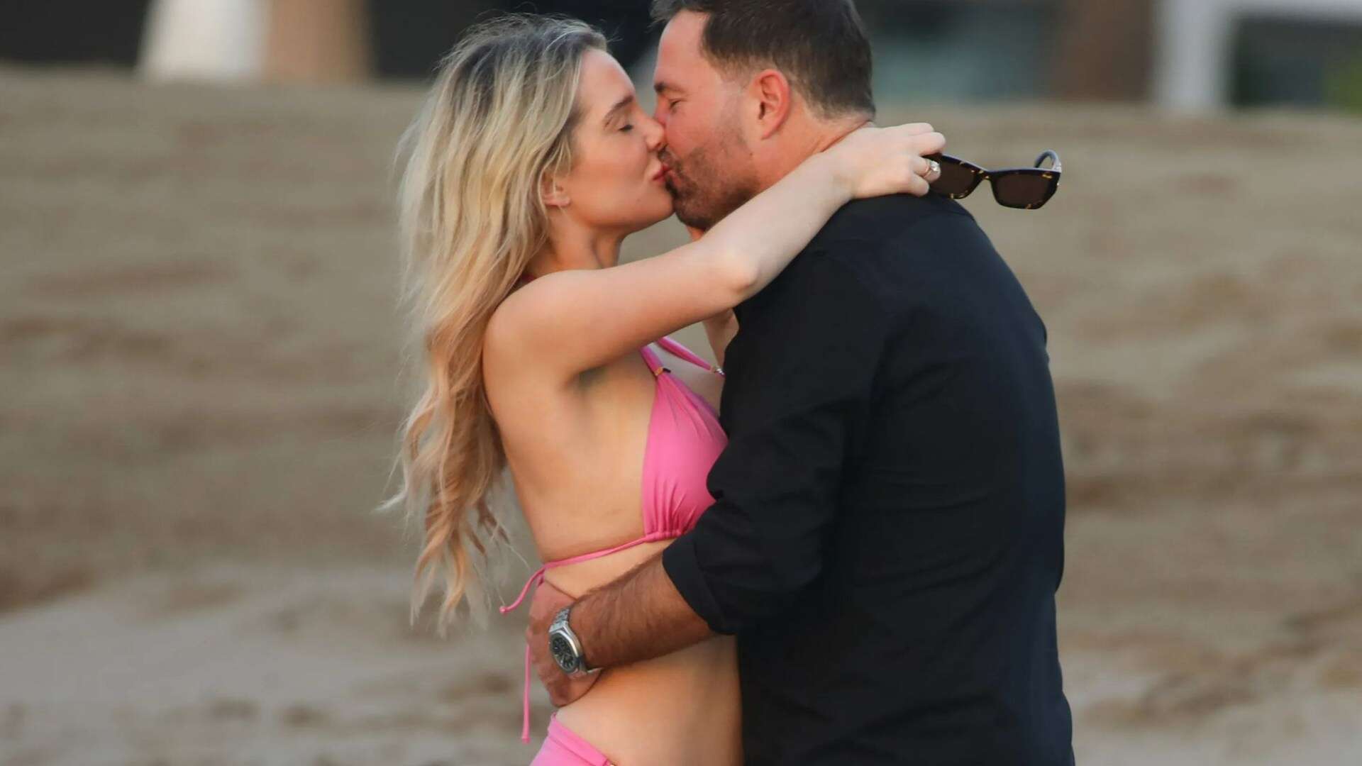 Helen Flanagan can't keep her hands off new man as pair snog on the beach