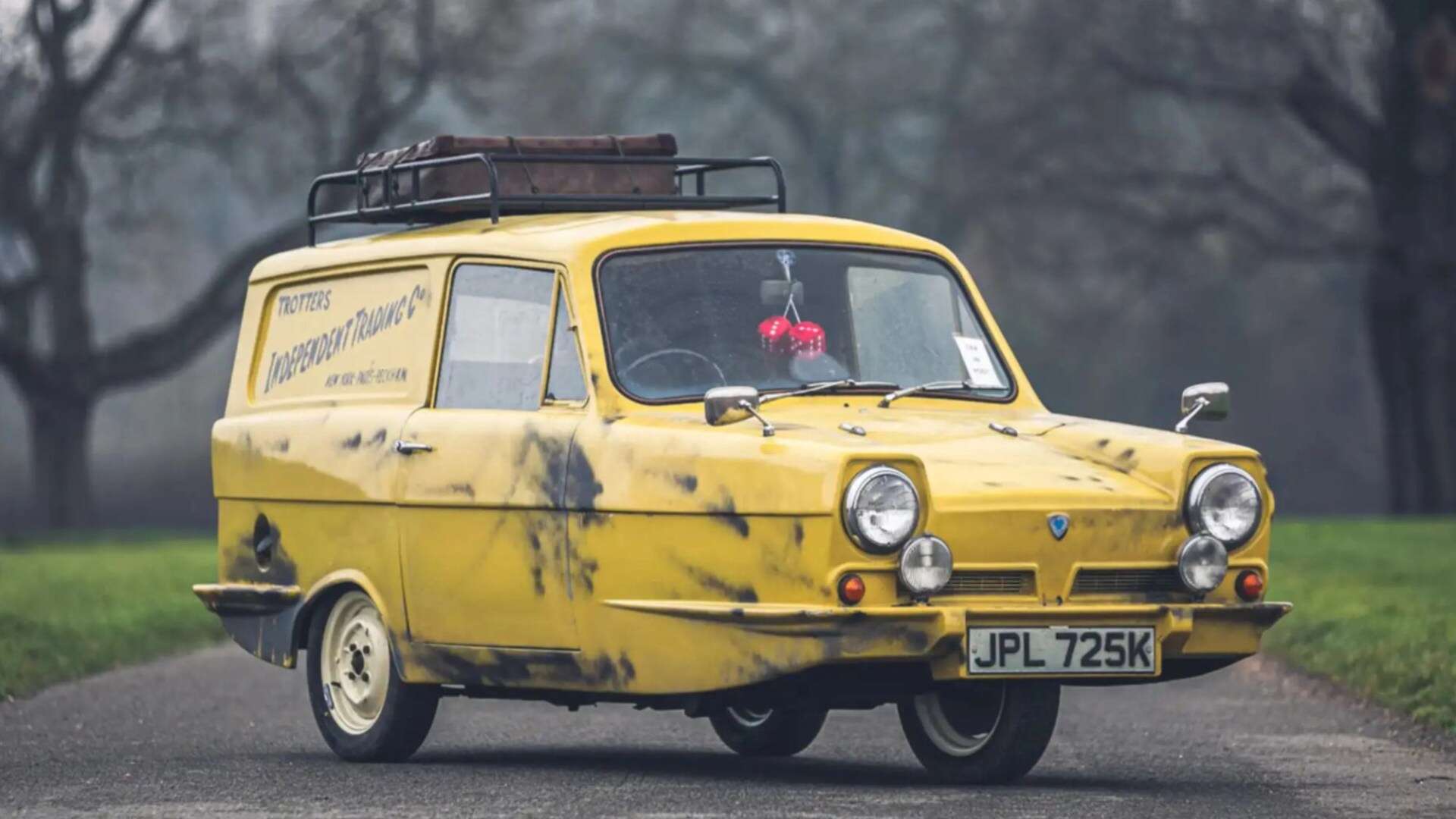 Del Boy's iconic three-wheeled 'grubby' yellow van sells at auction for £26k