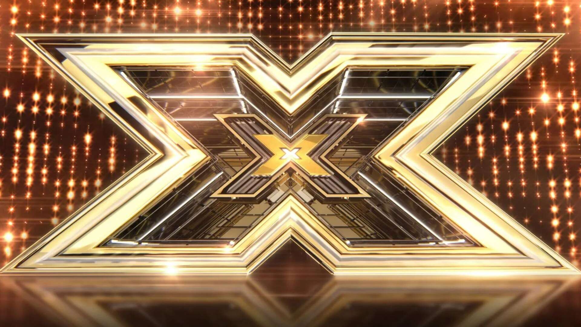 X Factor star engaged after being 'forced' to hide same-sex relationship