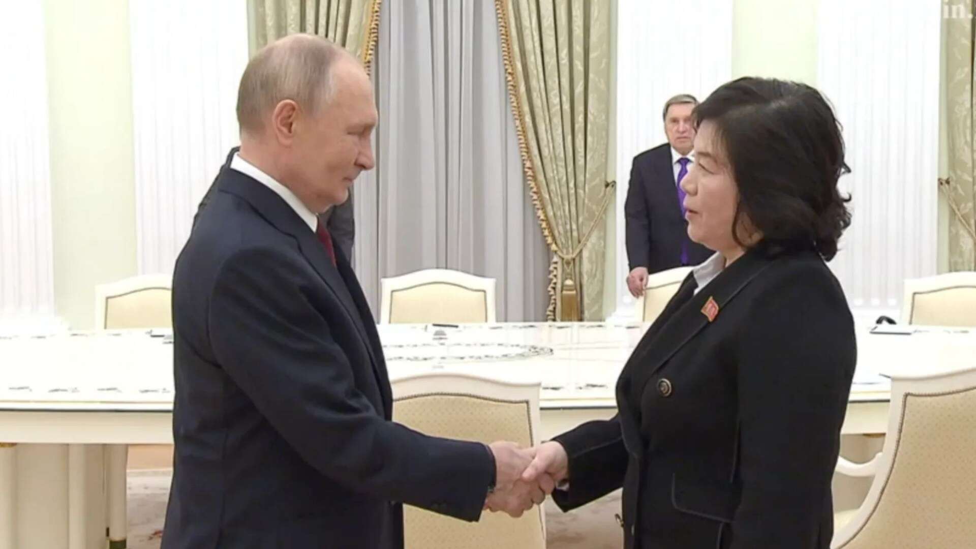 Watch Putin cling on to North Korea official's hand with vice-like grip