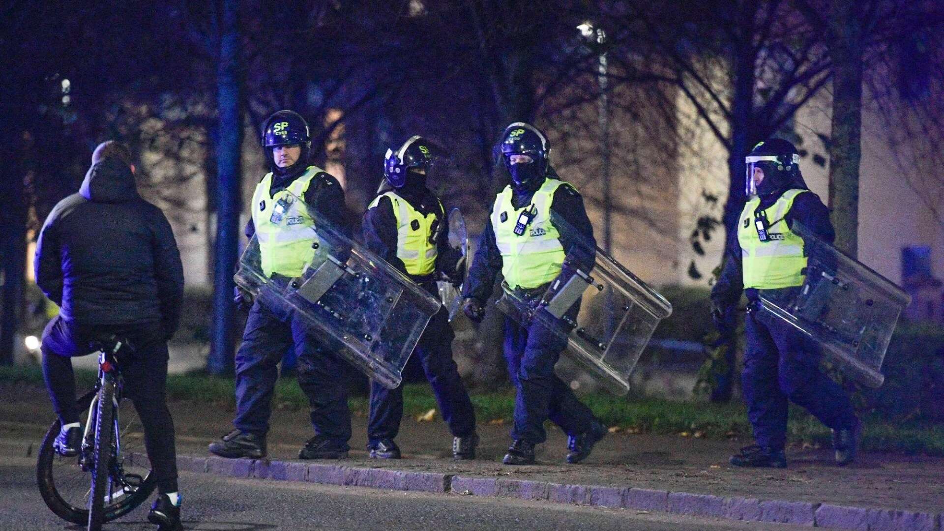 Riot cops clash with firework yobs & police chopper called in as gangs run amok