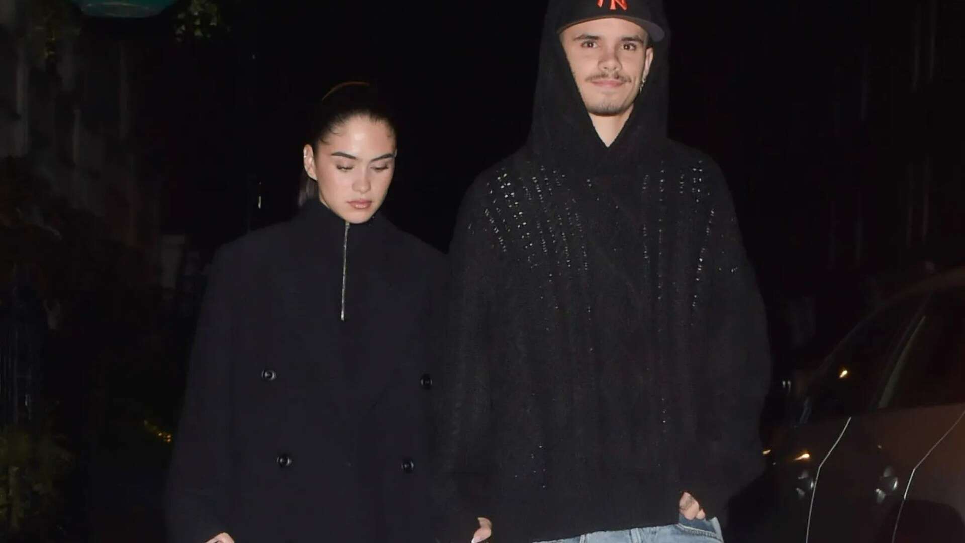 Romeo Beckham holds hands with new girlfriend Kim Turnbull on date night