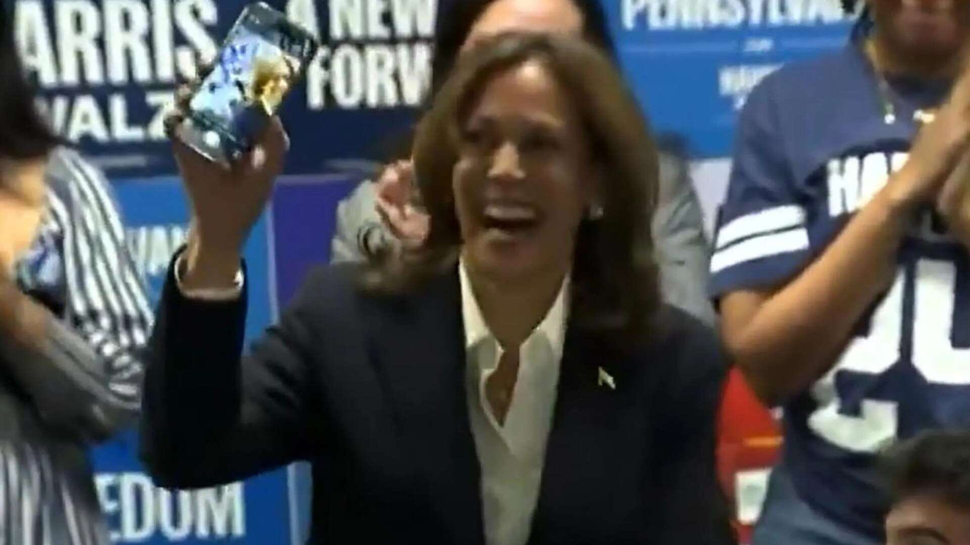 Harris accused of staging voter call as she turns around phone to reveal CAMERA