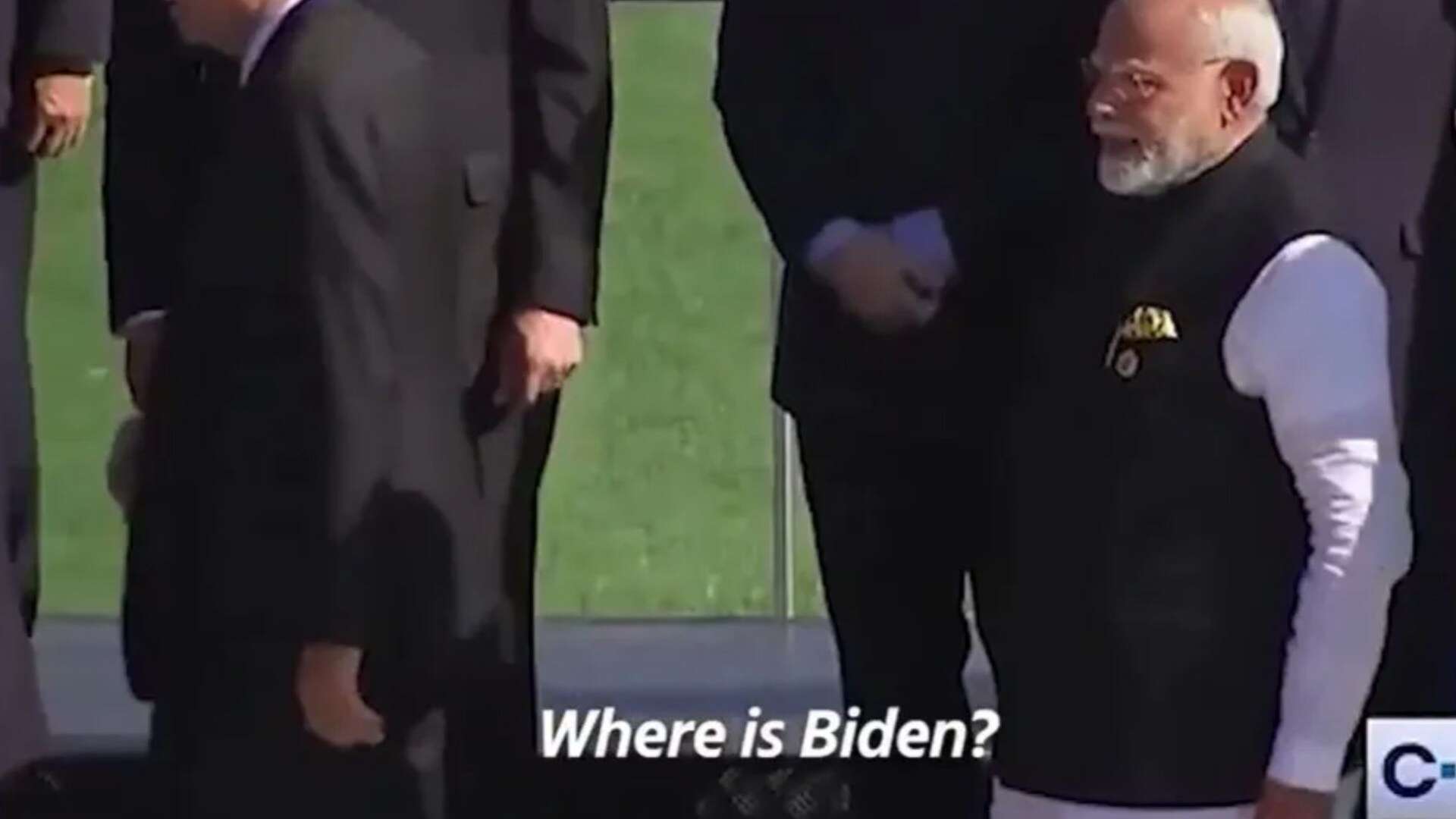 Moment Biden is seen wandering behind TREE as he misses G20 group pic