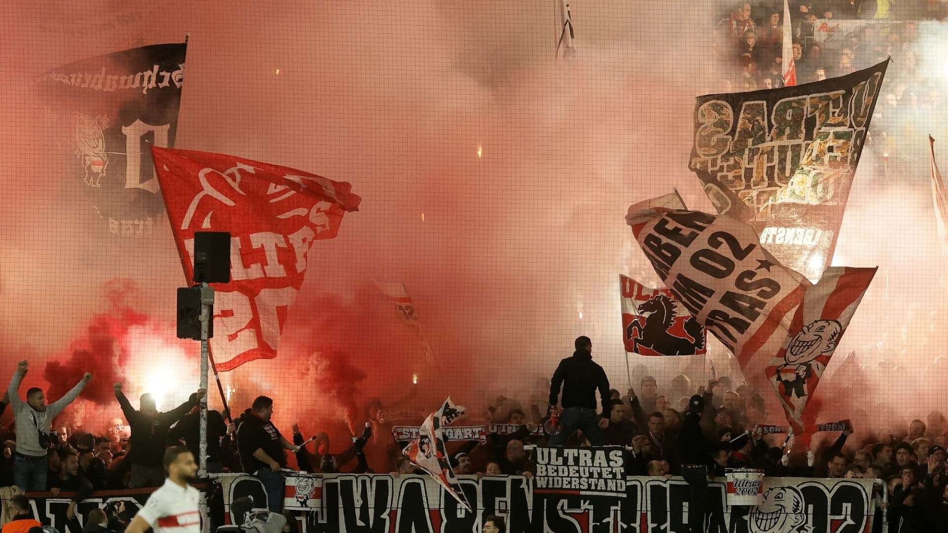 Ball boy injured after being hit by burning flare during Champions League clash