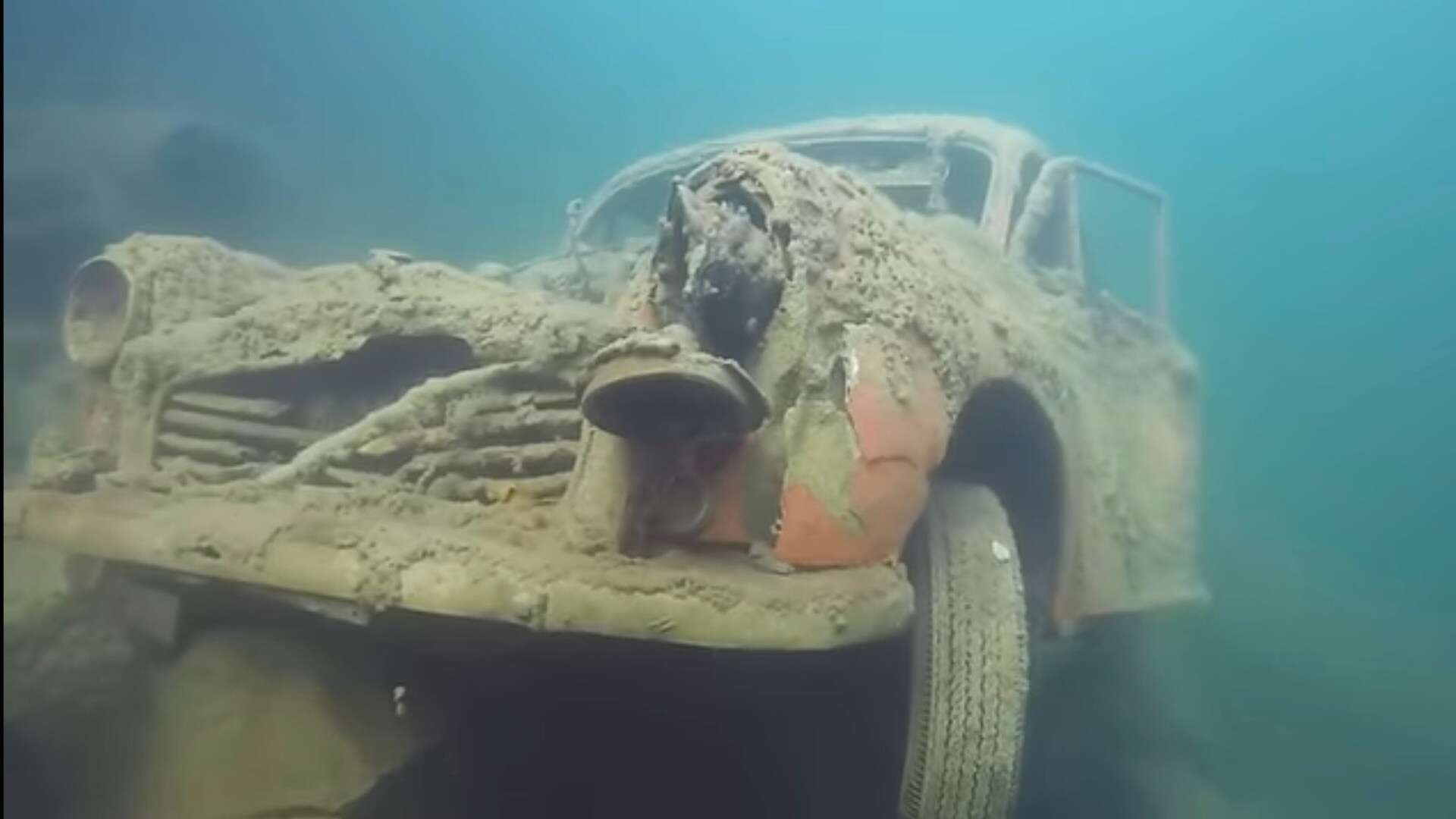 Underwater car graveyard where shells of motors are left to rot & reason why