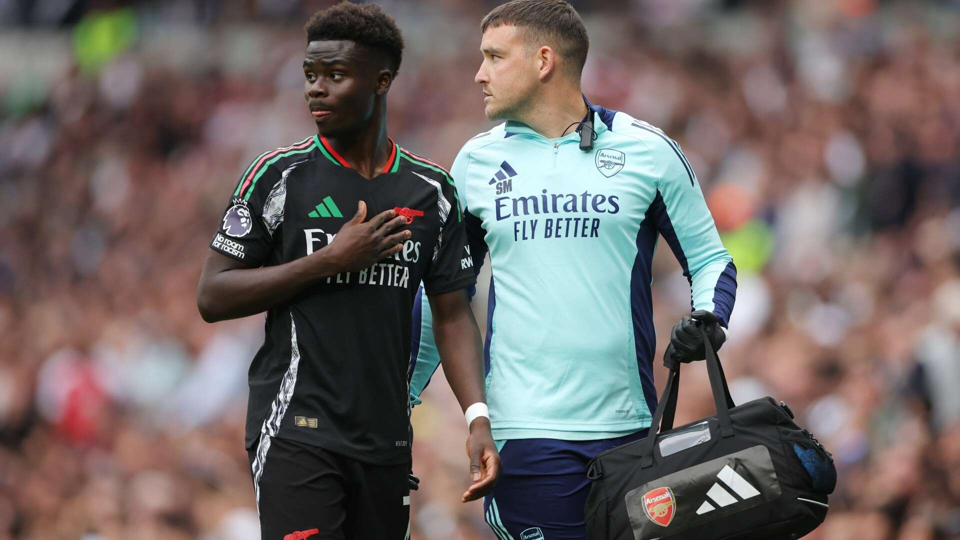 Saka leaves Arsenal fans worried as he shakes head before going off injured