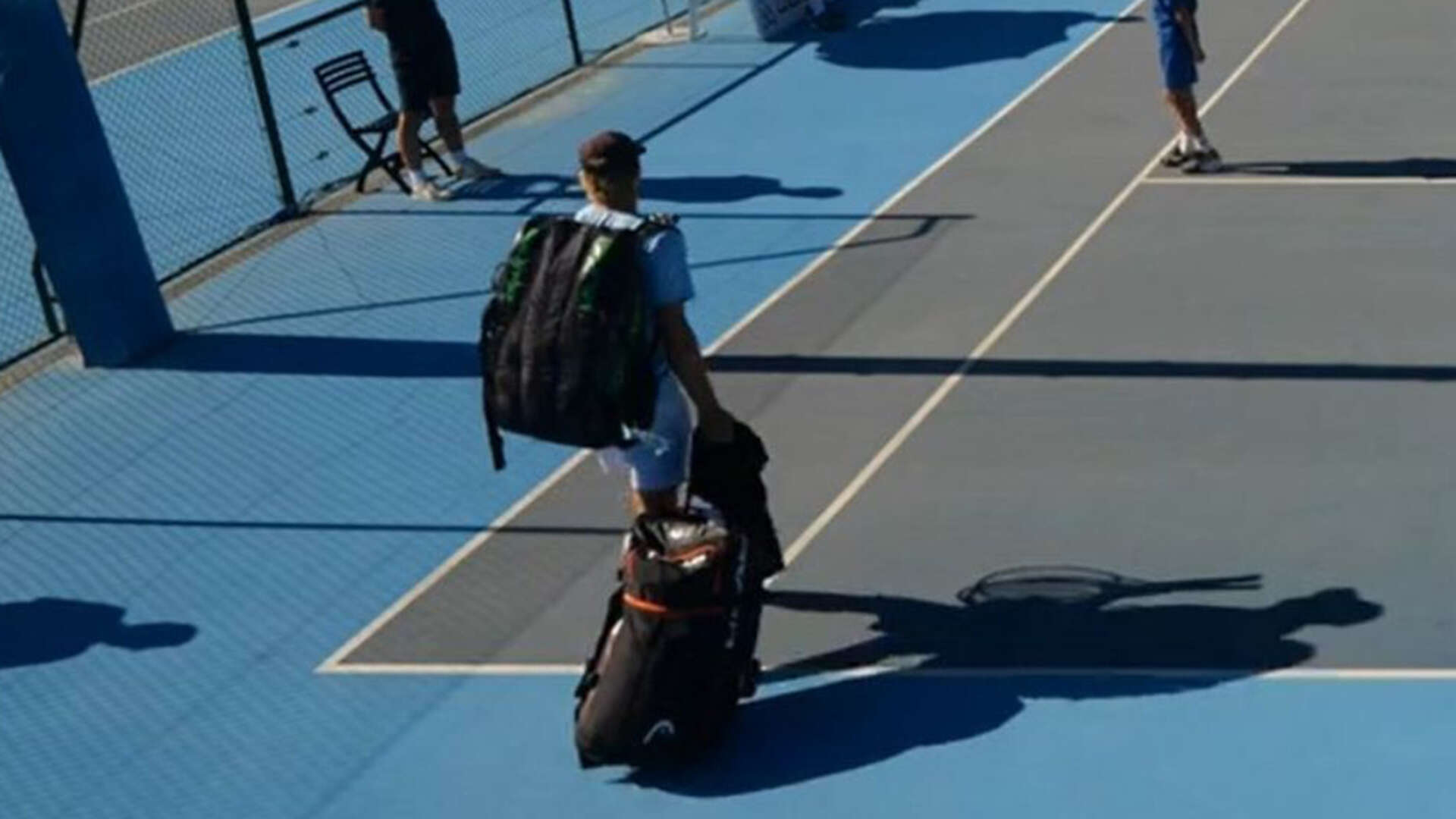 Never-before-seen moment tennis ace turns up on court with SUITCASE after dash