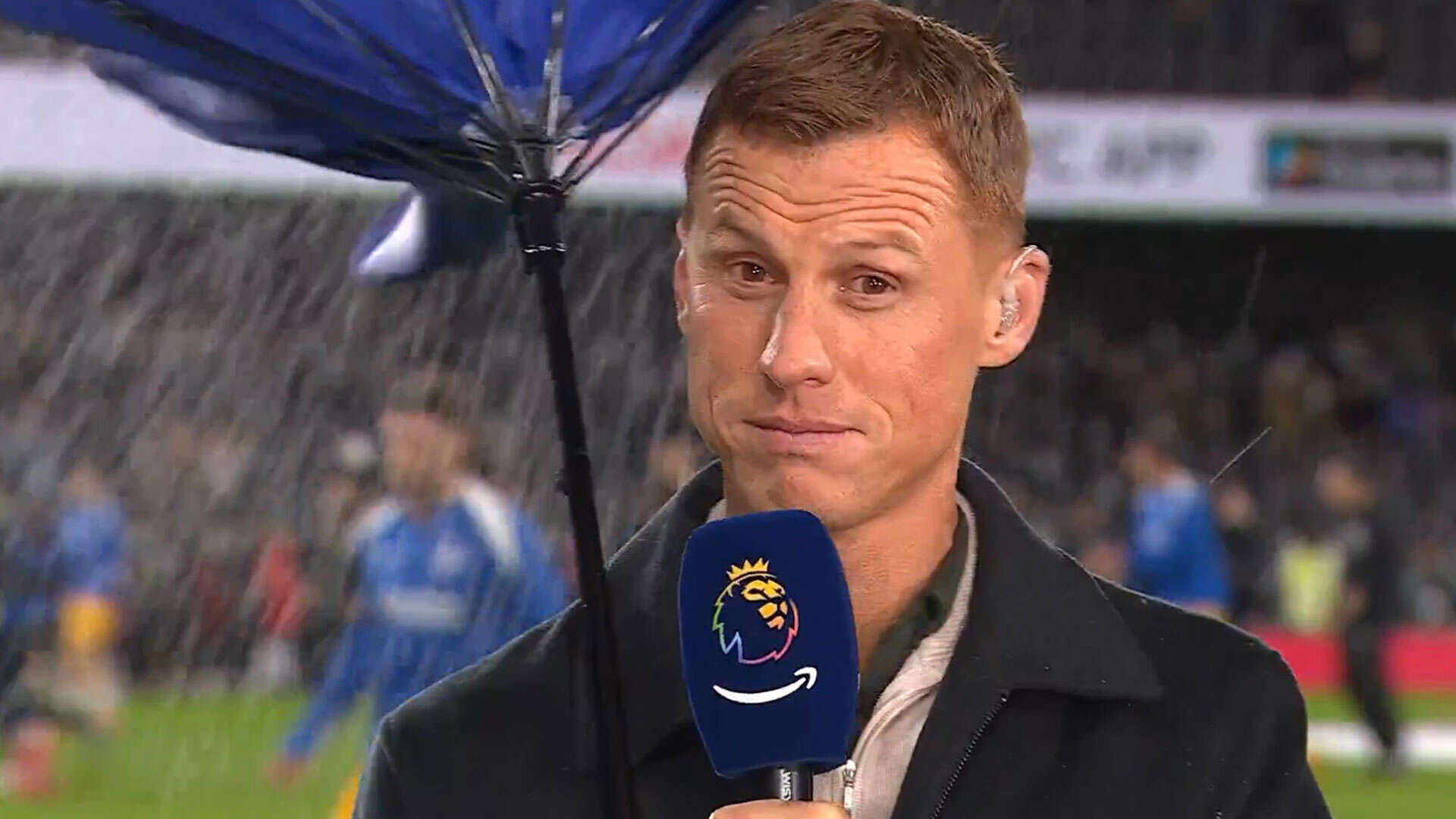 Watch Sidwell ‘almost turn into Mary Poppins' as storm causes brolly havoc