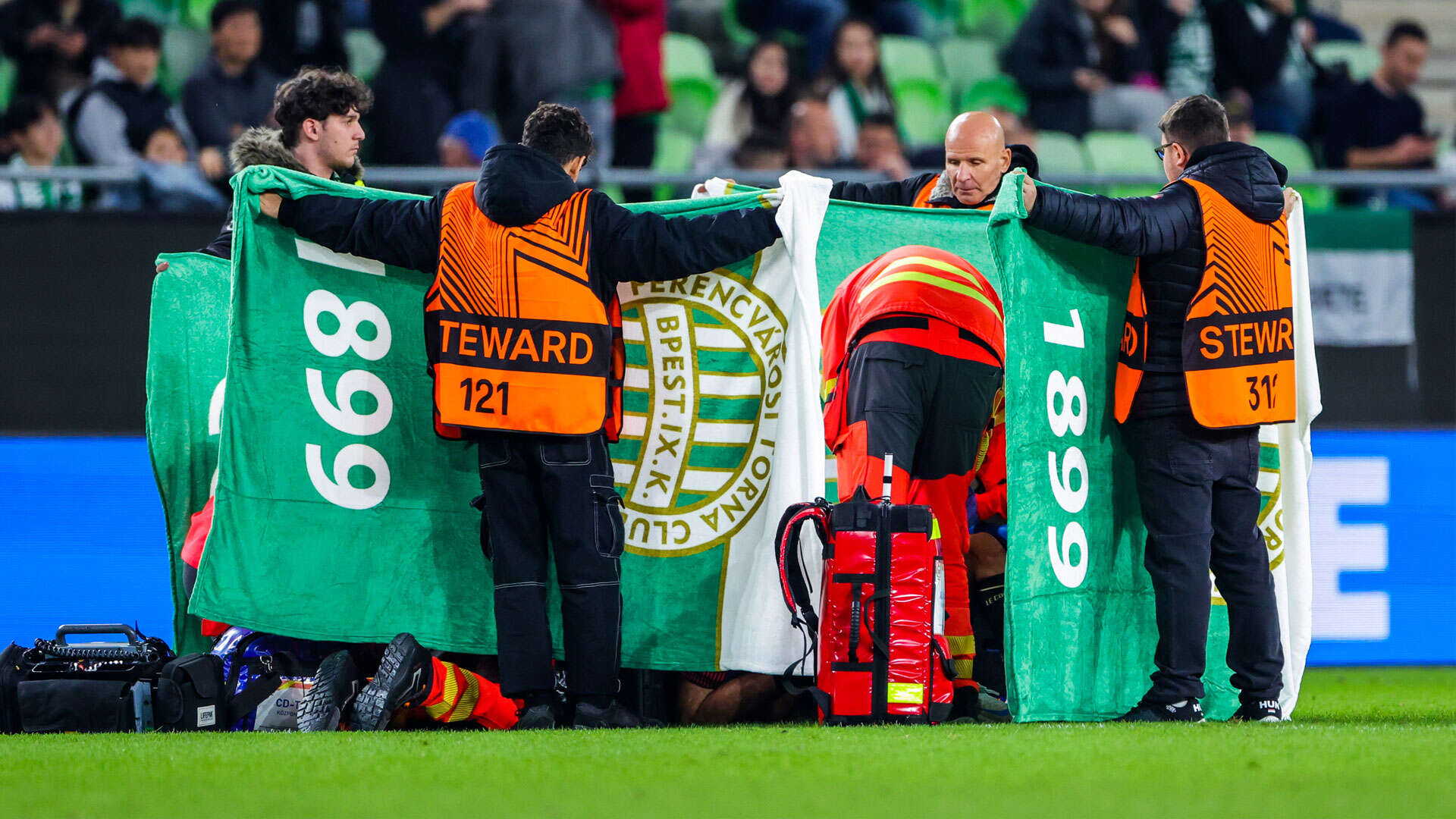 Medics rush to help and cover Nice star Sofiane Diop after terrifying injury