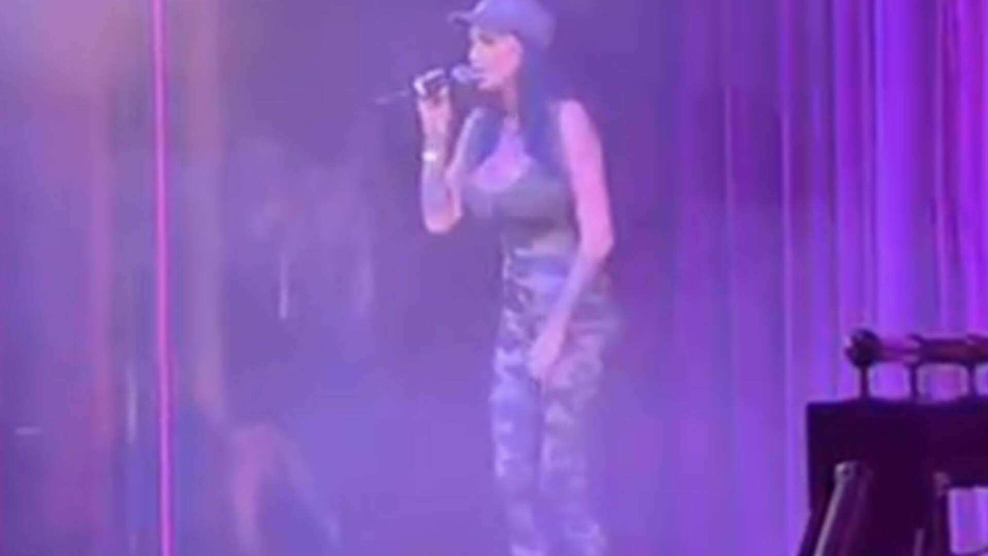 Katie Price hijacks the stage at drag contest to belt out hit single