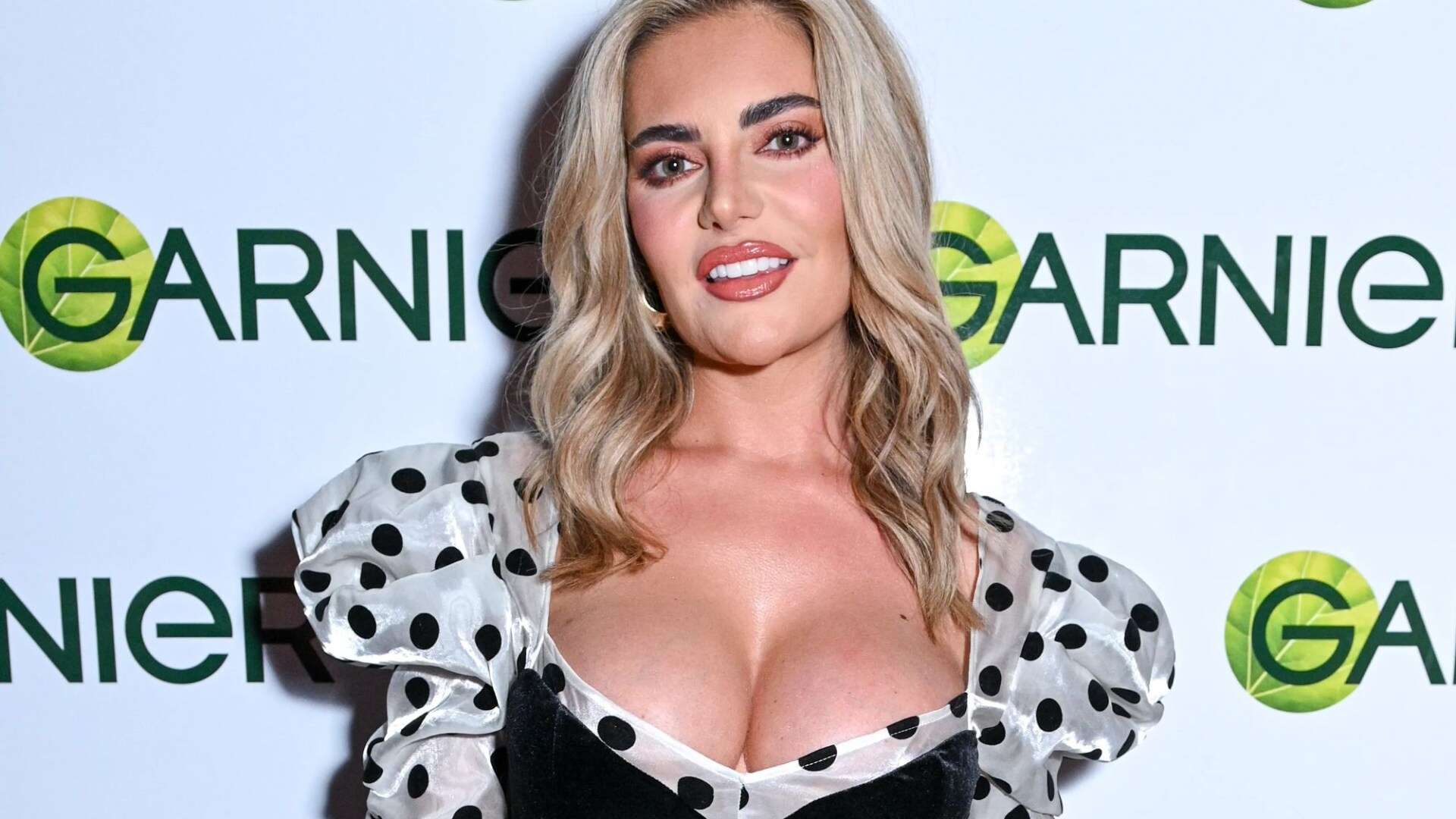 Megan Barton Hanson looks incredible in plunging polka dot dress