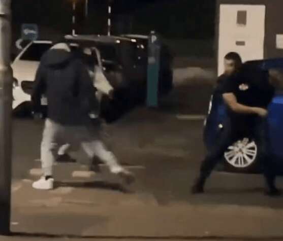 Terrifying moment machete duel erupts as gangs swing wildly at each other