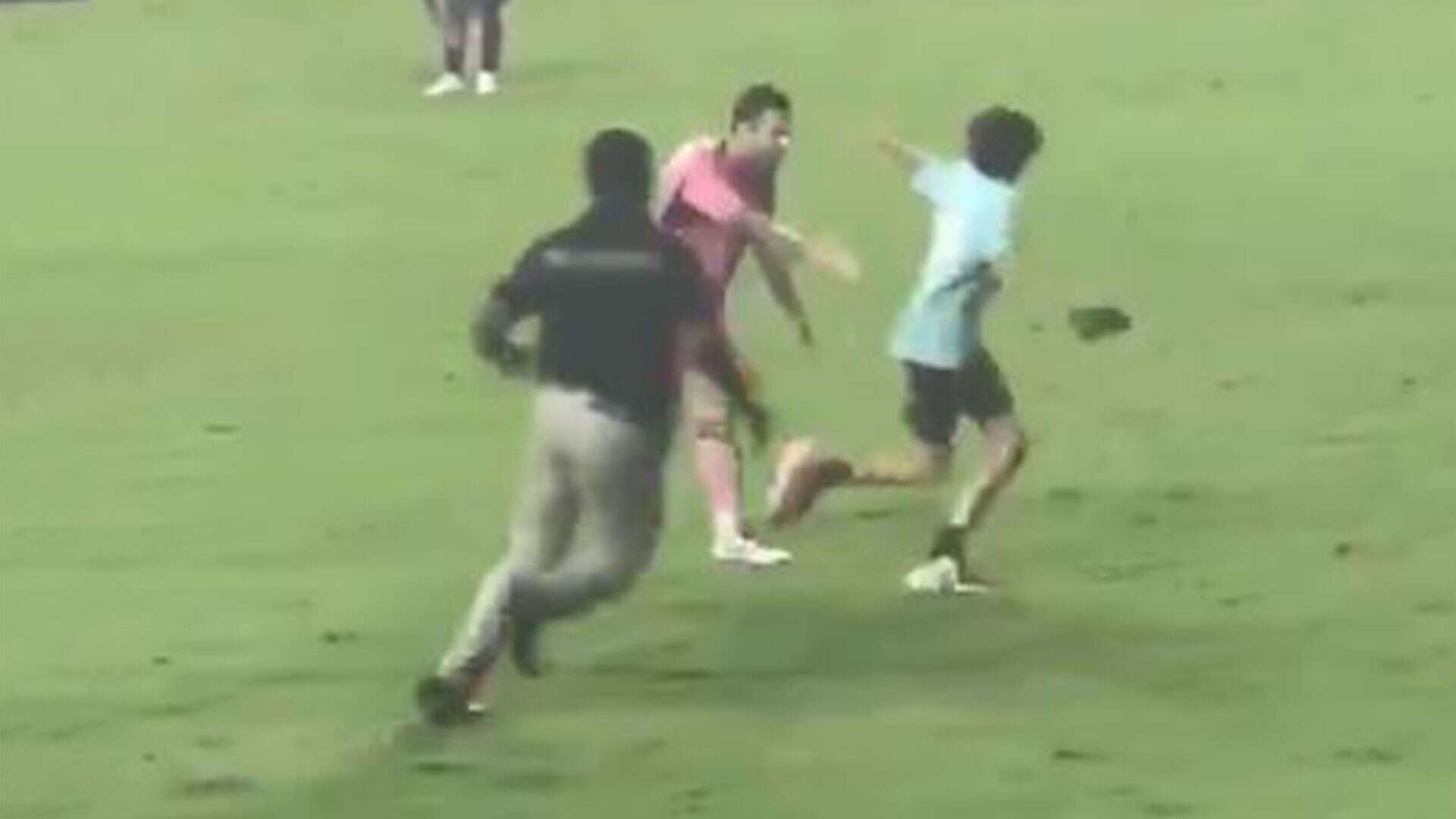 Watch moment Lionel Messi 'helps pitch invader outrun security'