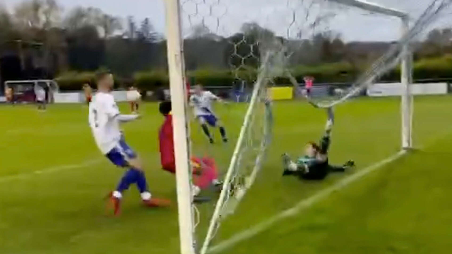 'Non-league at its best', joke fans as keeper stuck in own net still makes save