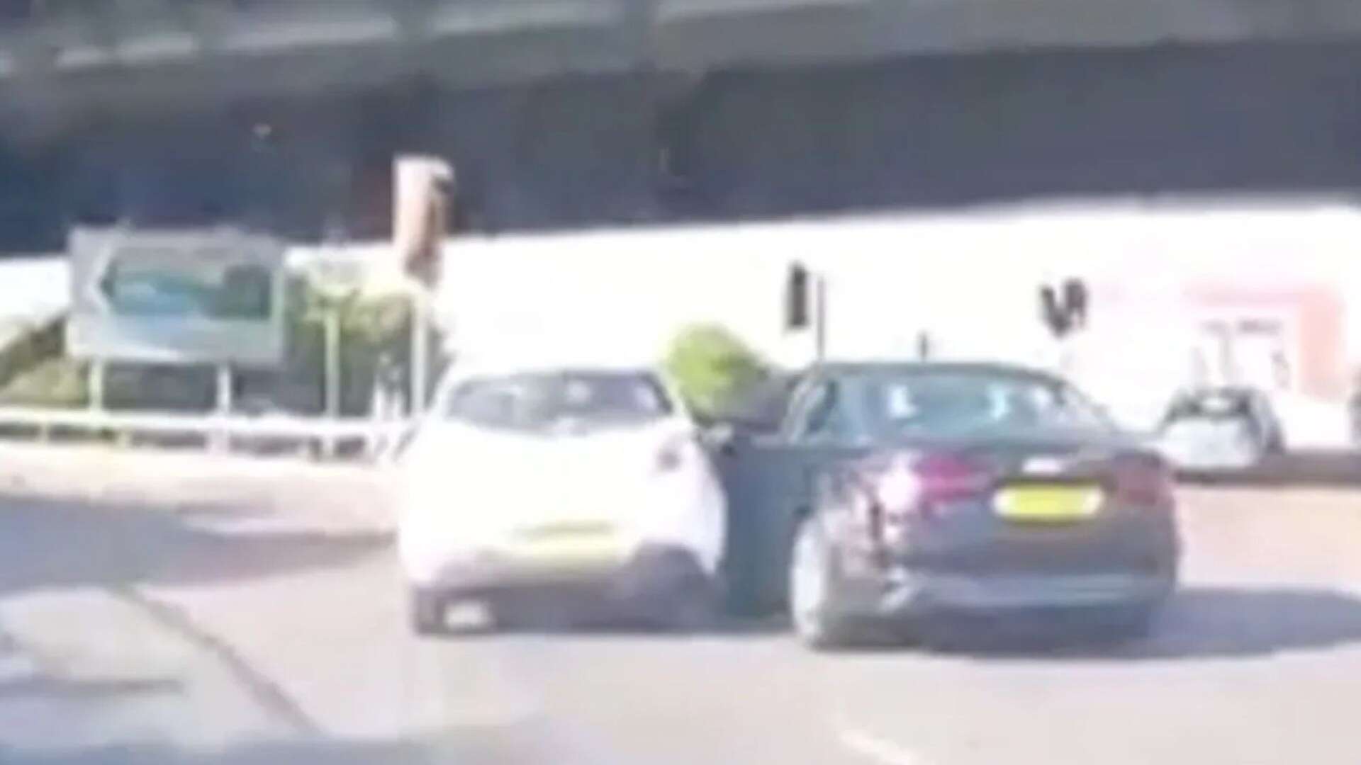 Bizarre roundabout crash sparks debate - some say BOTH drivers are in the wrong