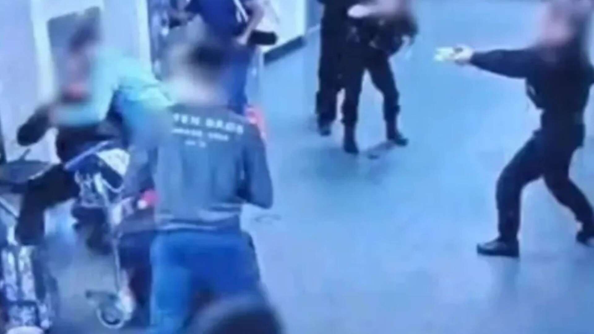 Two brothers charged over Manchester Airport brawl that sparked protests