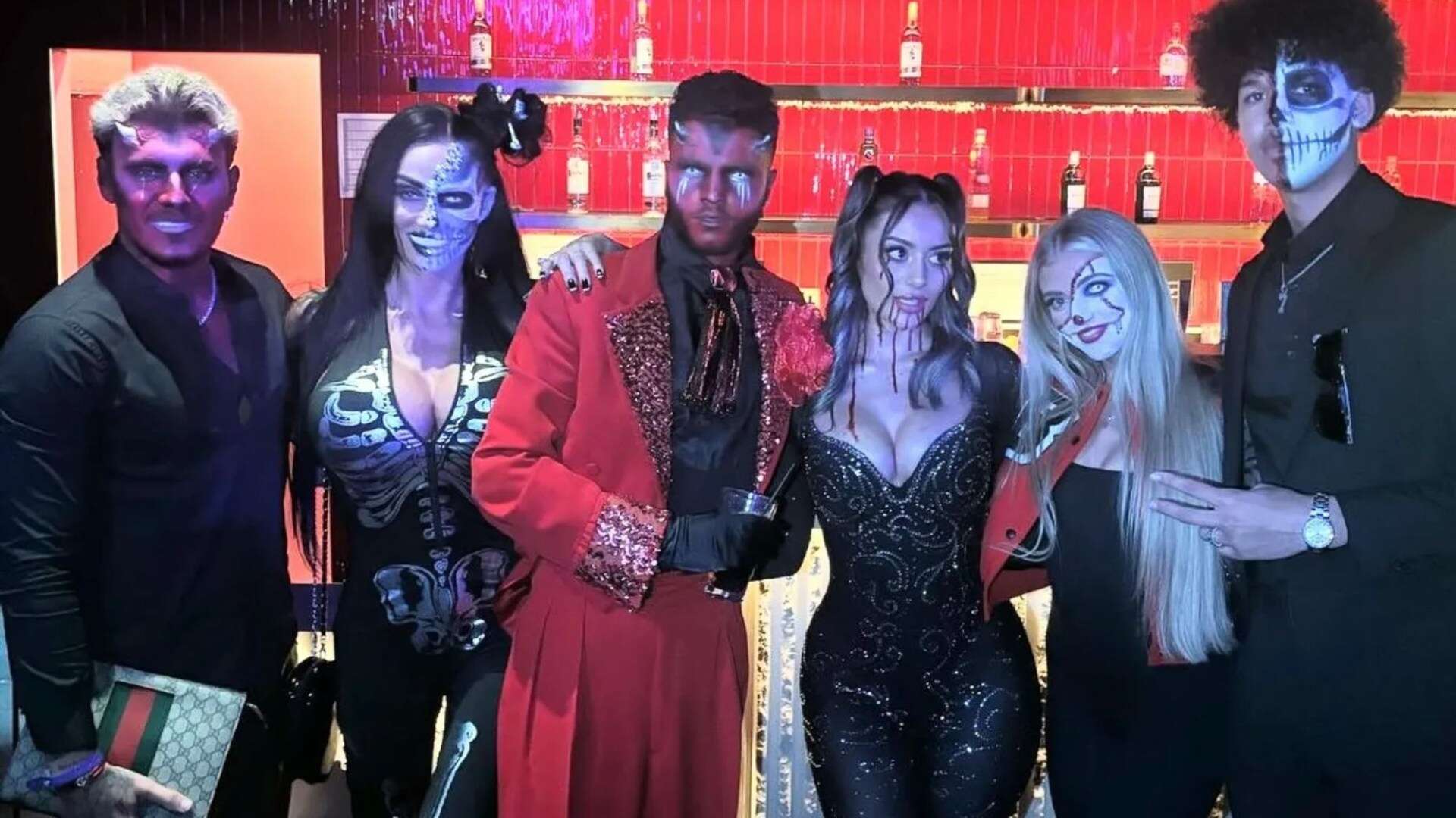 Proud mum Katie Price poses with Junior and Princess and their partners