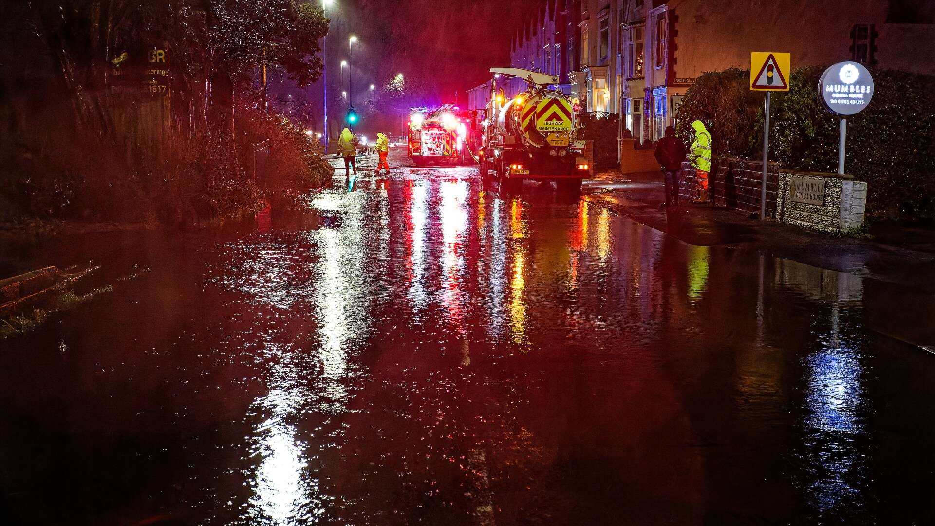 Flash floods hit parts of UK as 'danger to life' warning issued over 80mph wind