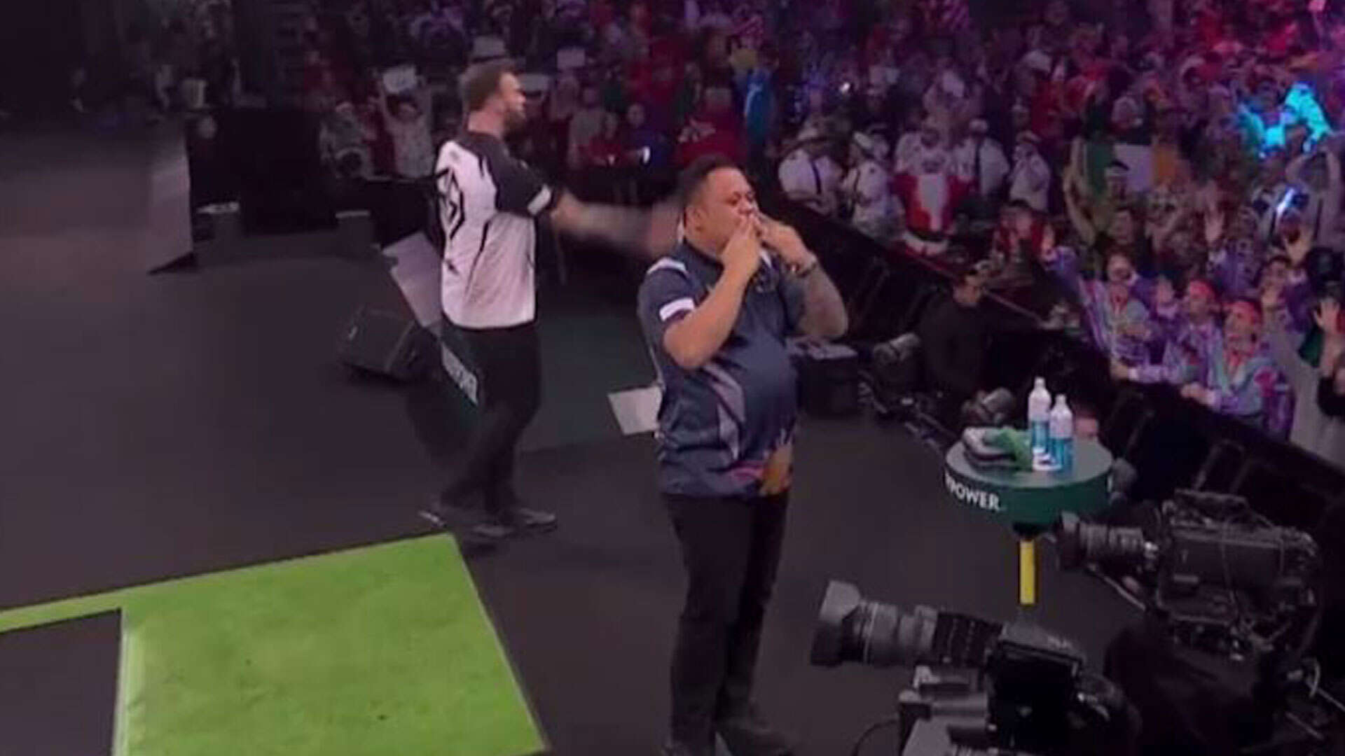 Ross Smith throws darts into the crowd after World Championship defeat