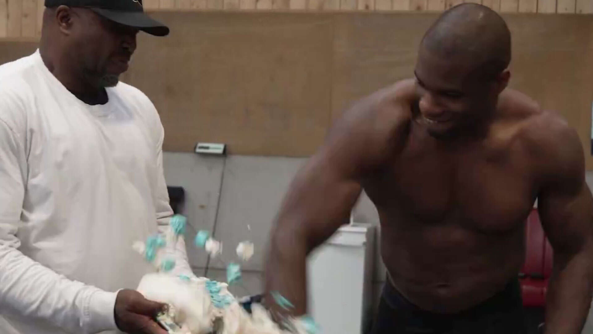 Watch Dubois punch birthday cake with AJ's face on it as fans send warning