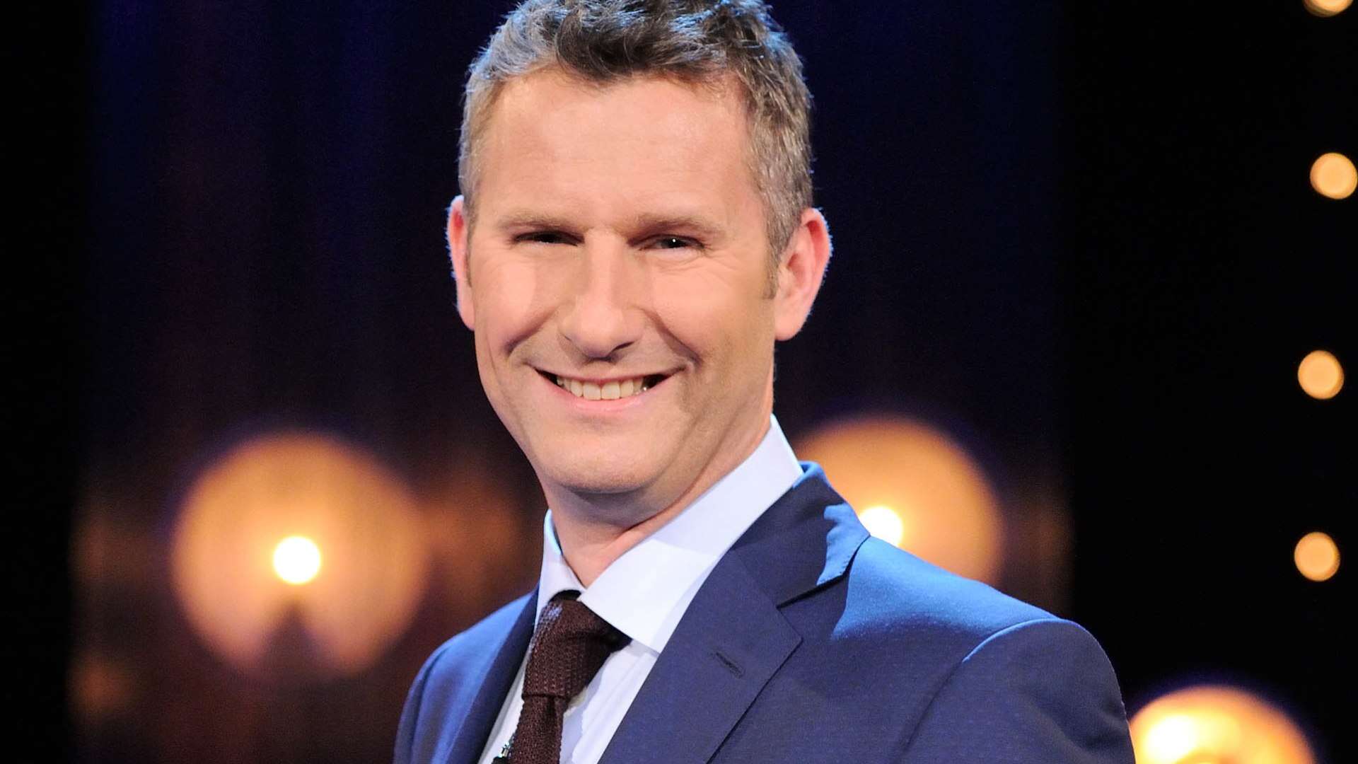 Comedian Adam Hills in shock career change as he takes up major sports role