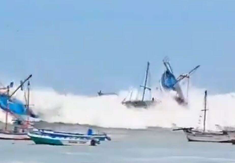 Terrifying moment massive freak waves sweep away boats & swamp seaside towns