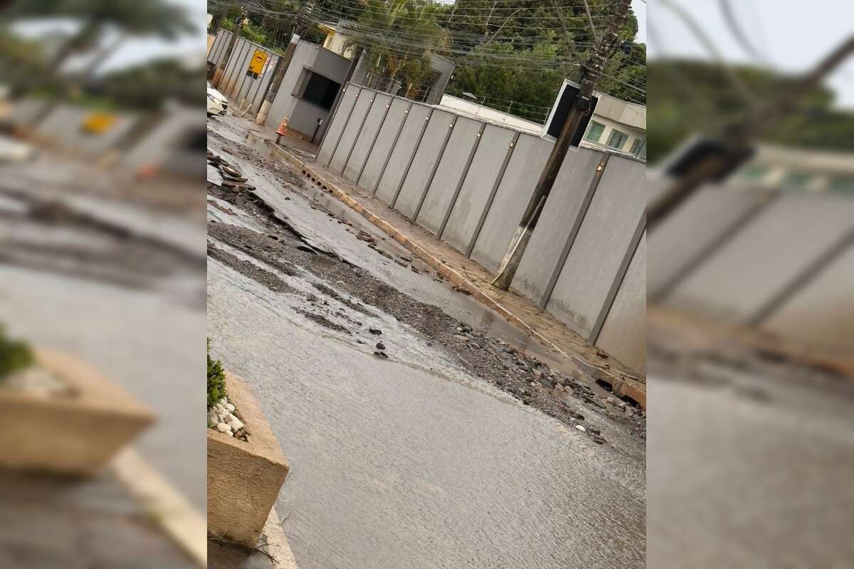 Asfalto arrancado e água na cintura: veja estragos da chuva no DF