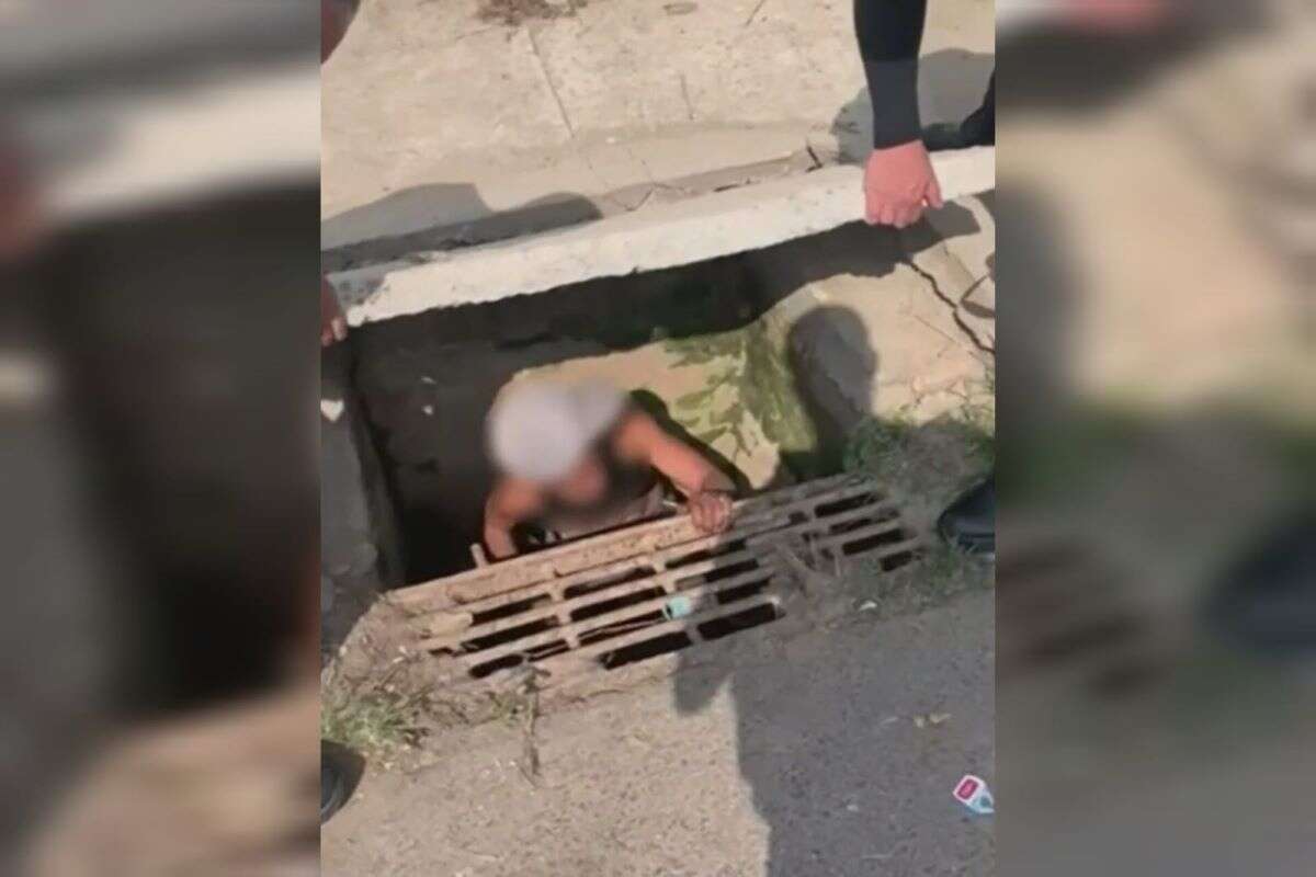 Vídeo: mulher é presa após ser encontrada com drogas dentro de bueiro