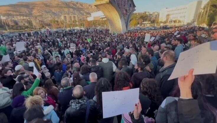 damasco proteste giovani piazza siria libera e laica