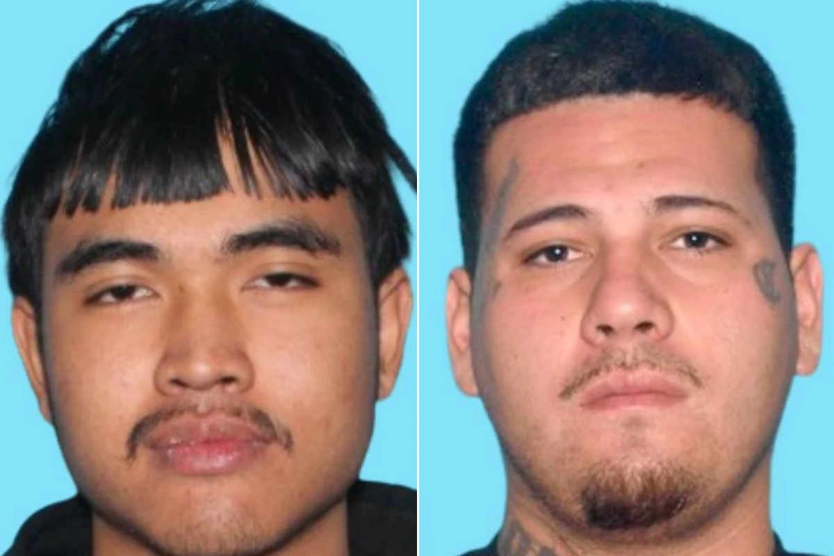 Two arrested after dad shot dead at barbershop with kids