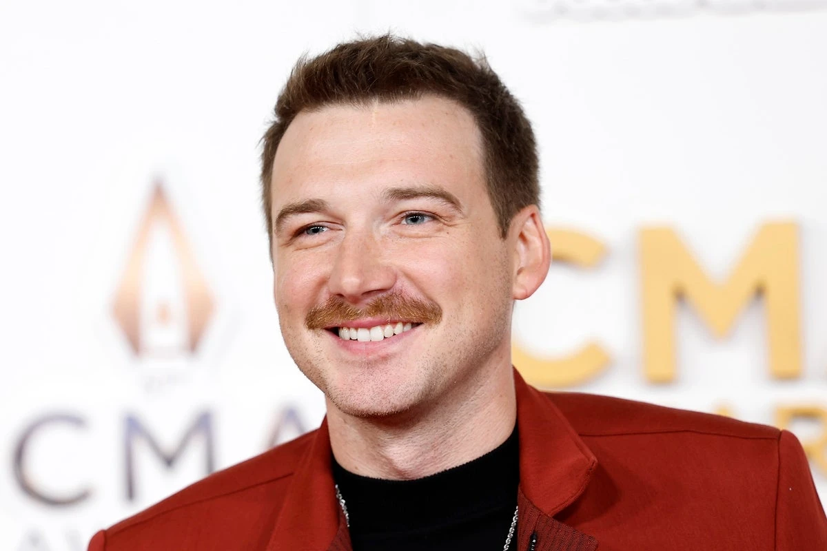 Morgan Wallen skips ACM Awards and posts photo with NFL legend instead