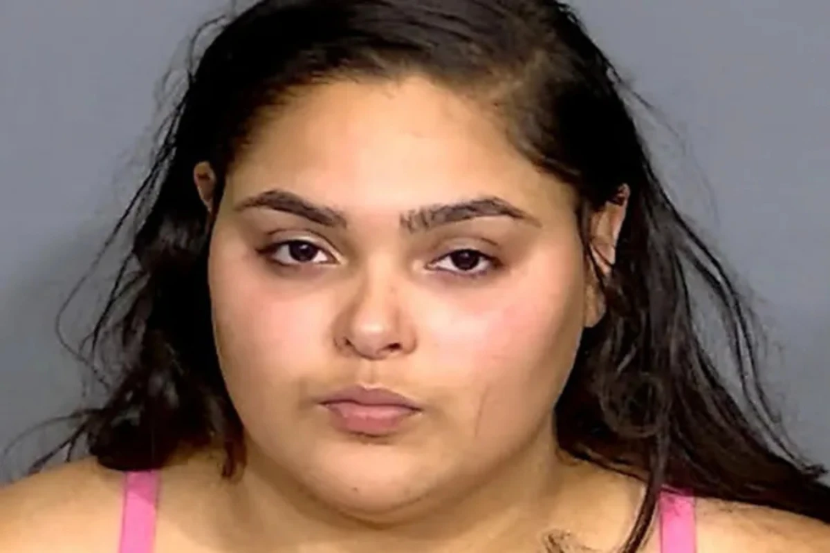 Woman charged with fatally shooting driver after honk at green light