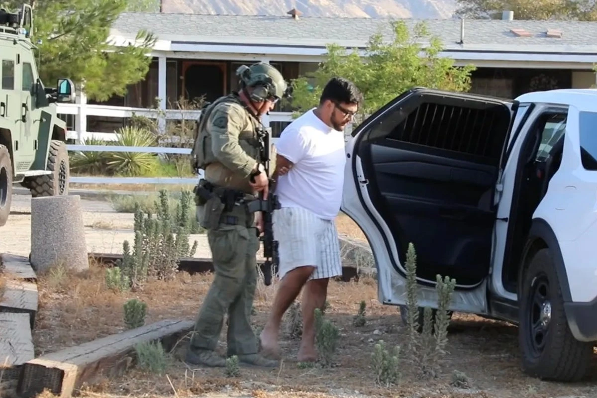 Emmanuel Haro’s father seen helping police search for baby’s body