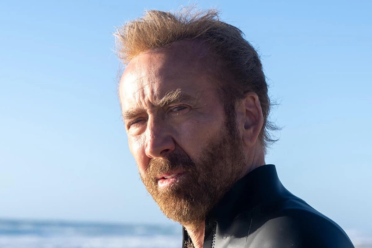 Nicolas Cage recounts close shark encounter and surfing mishaps