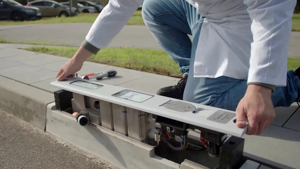 Can you find this sidewalk EV charger? It’s hiding inside the curb