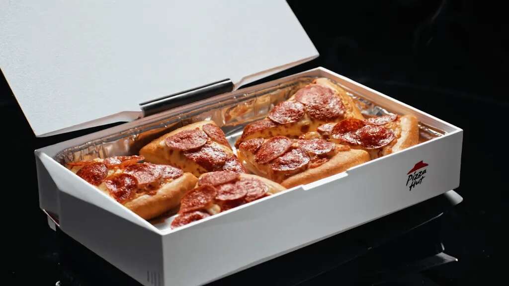 Pizza Hut’s new box uses the heat from a video game console to keep pizza warm