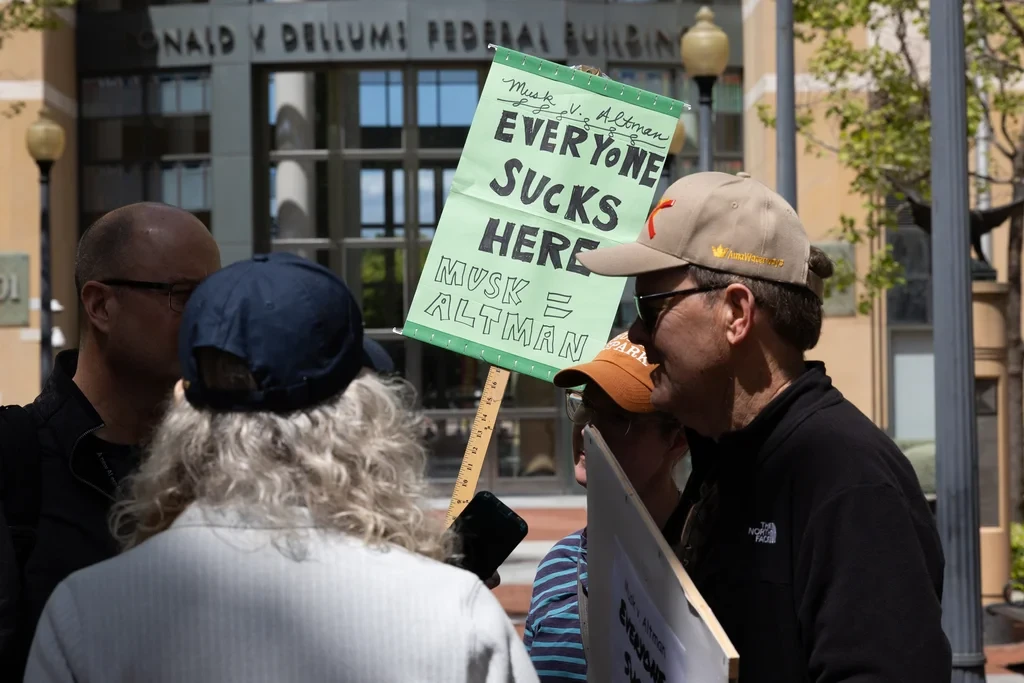 Some fantastically weird protest art is popping up outside the OpenAI trial